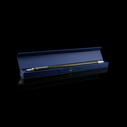 Steamulation Carbon Mouthpiece in gold finish inside box – dark view.
